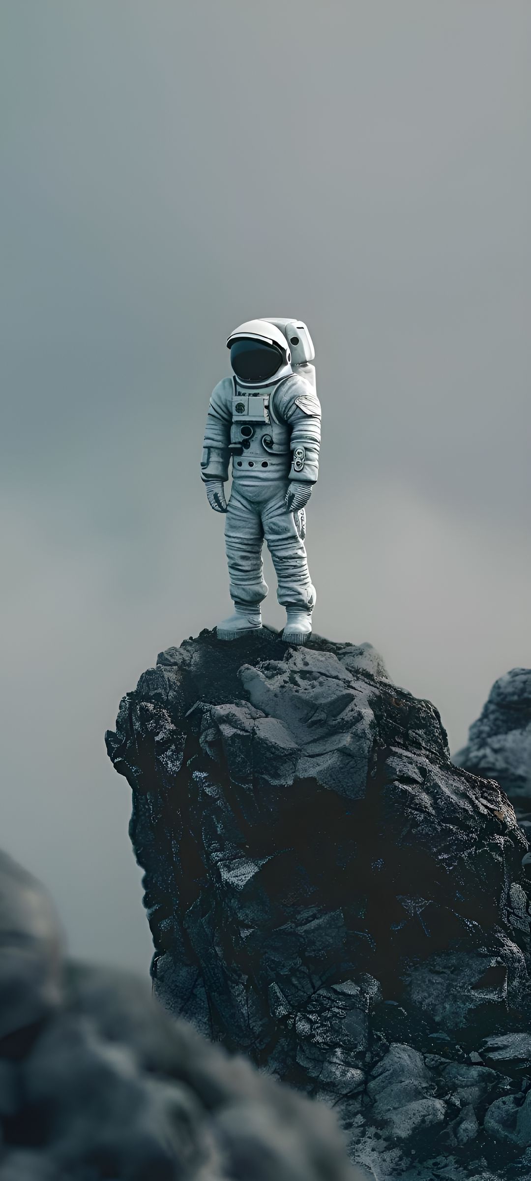 Astronaut on Rocky Peak 4K Mobile Wallpaper HD Wallpaper